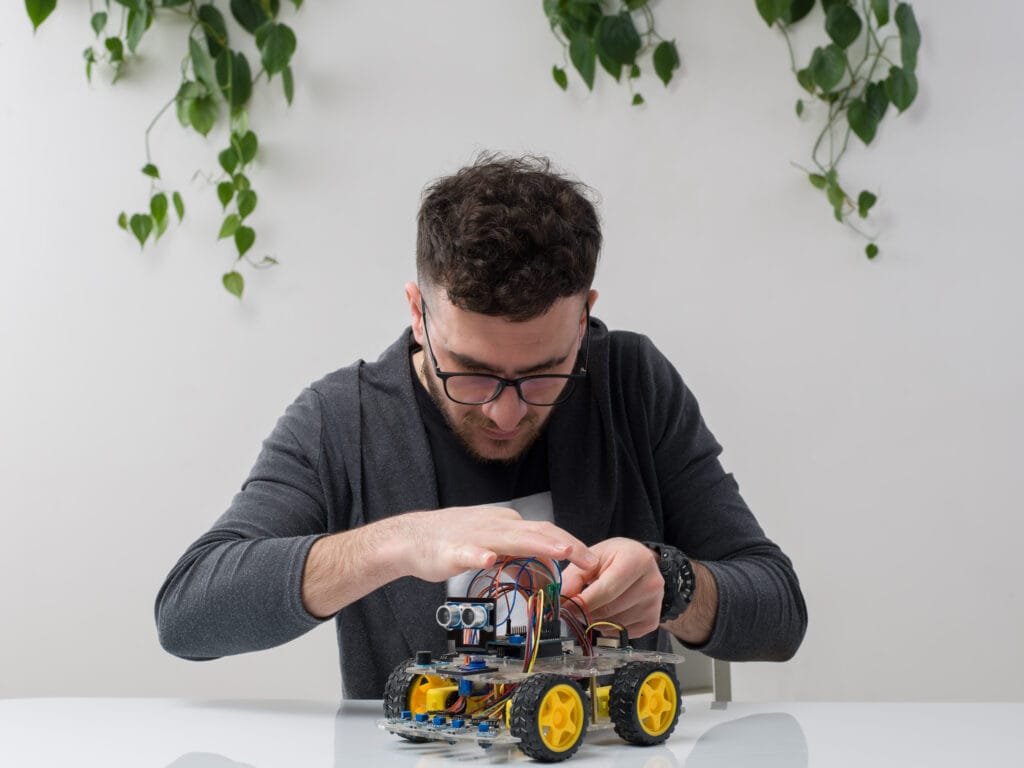 DIY robots using python image by freepik Image by KamranAydinov on Freepik